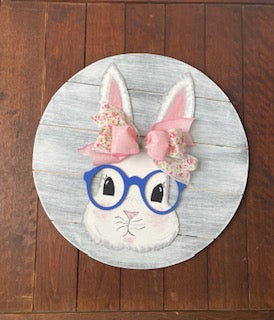 Spring bunny with purple glasses and pink ribbon
