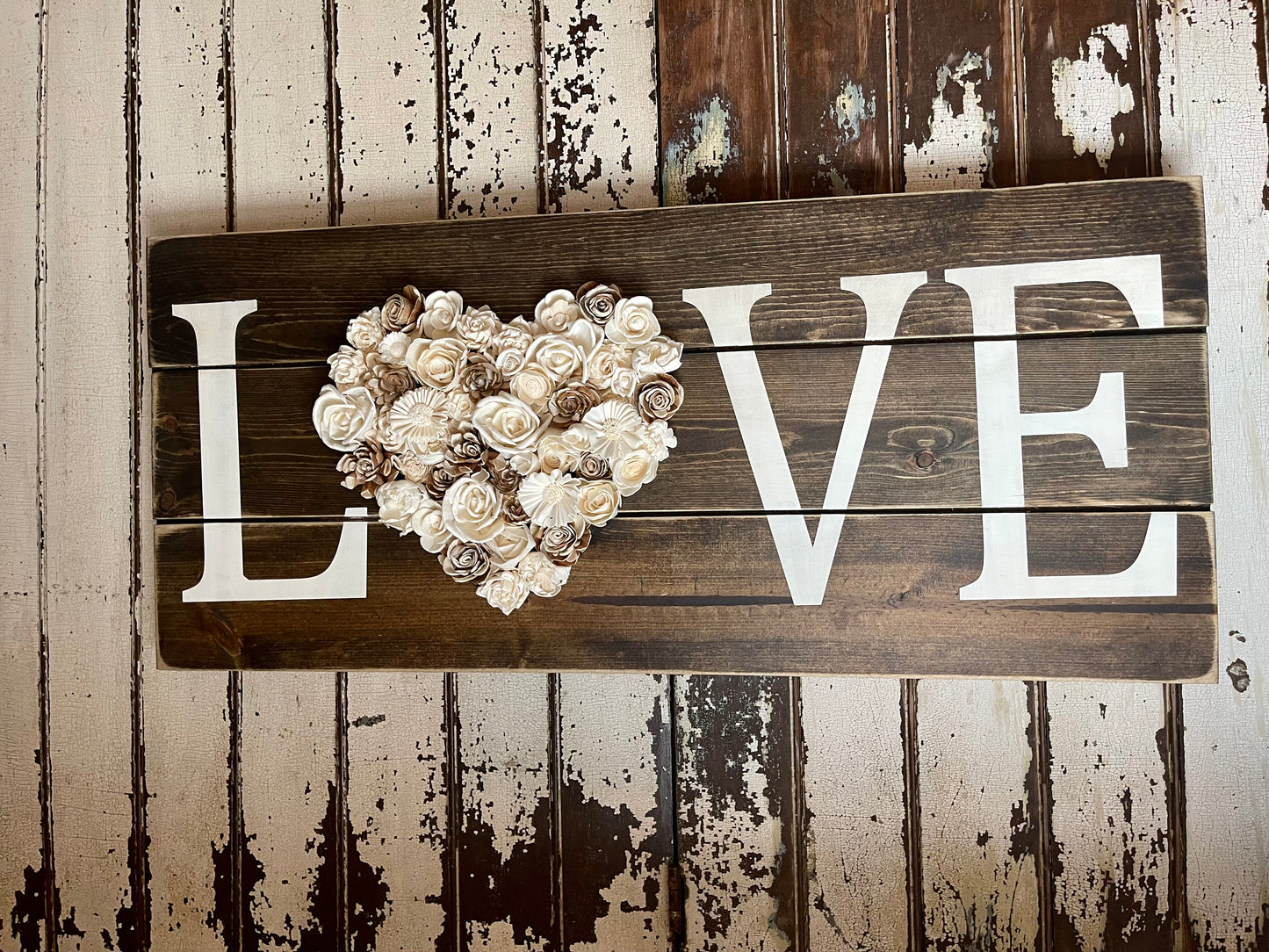 Love sign with wood flowers