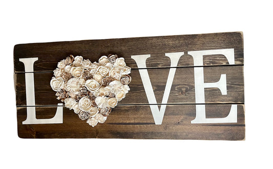 Love sign with wood flowers