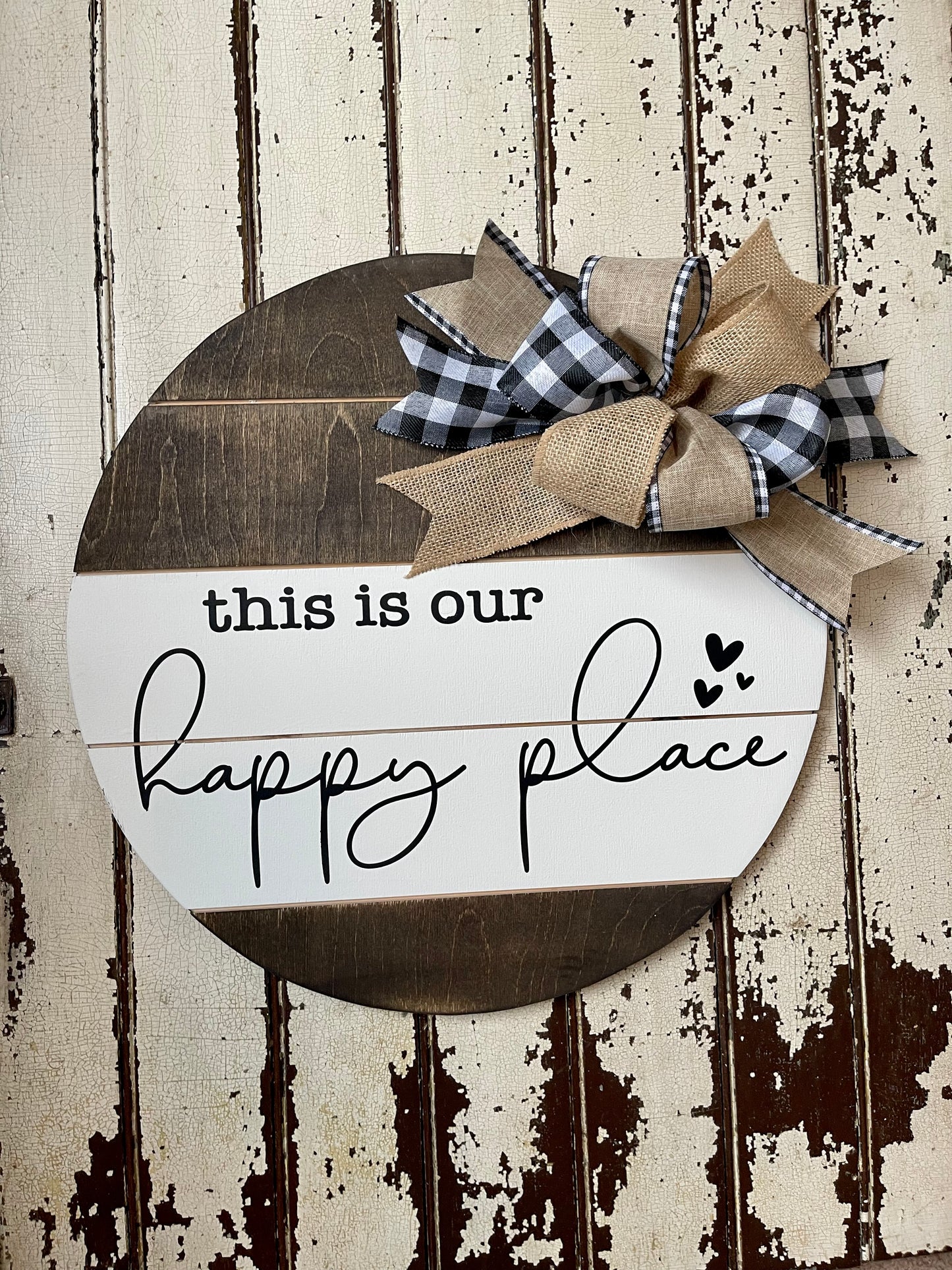 This is our Happy Place sign, wood door hanger